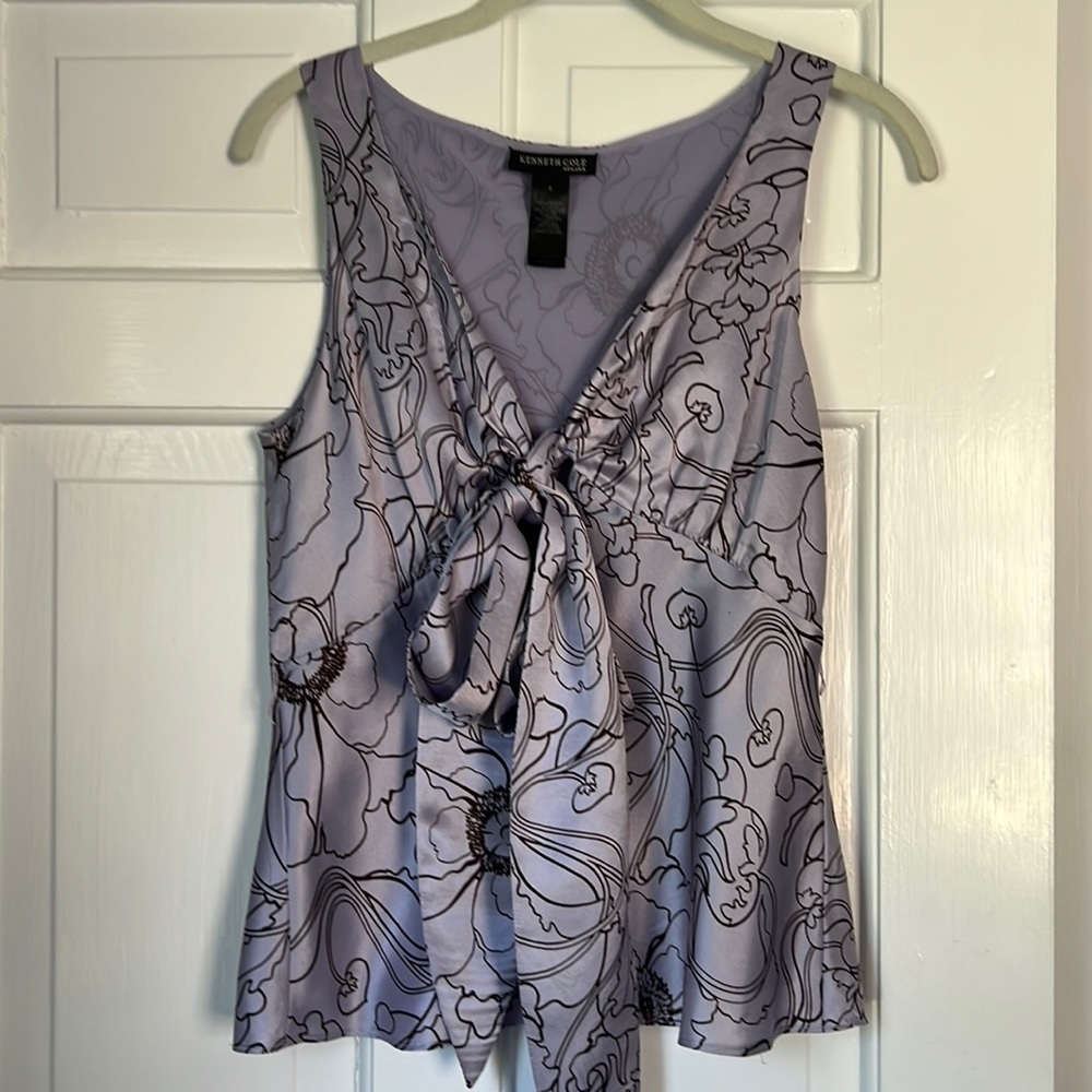 Dressy shirt for work or night out. Tie front or can be worn as belt to tie back